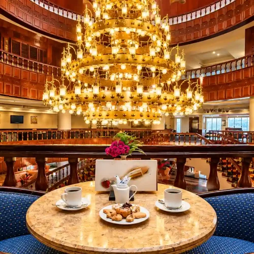 Luxurious Atrium Café with Golden Chandelier