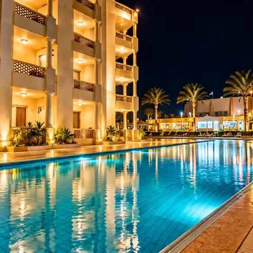 Luxury Poolside Resort at Night
